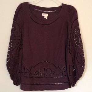 Purple peasant top with cut out design.